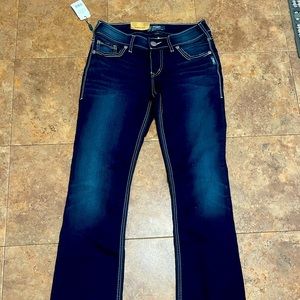 Brand new with tags women silver jeans